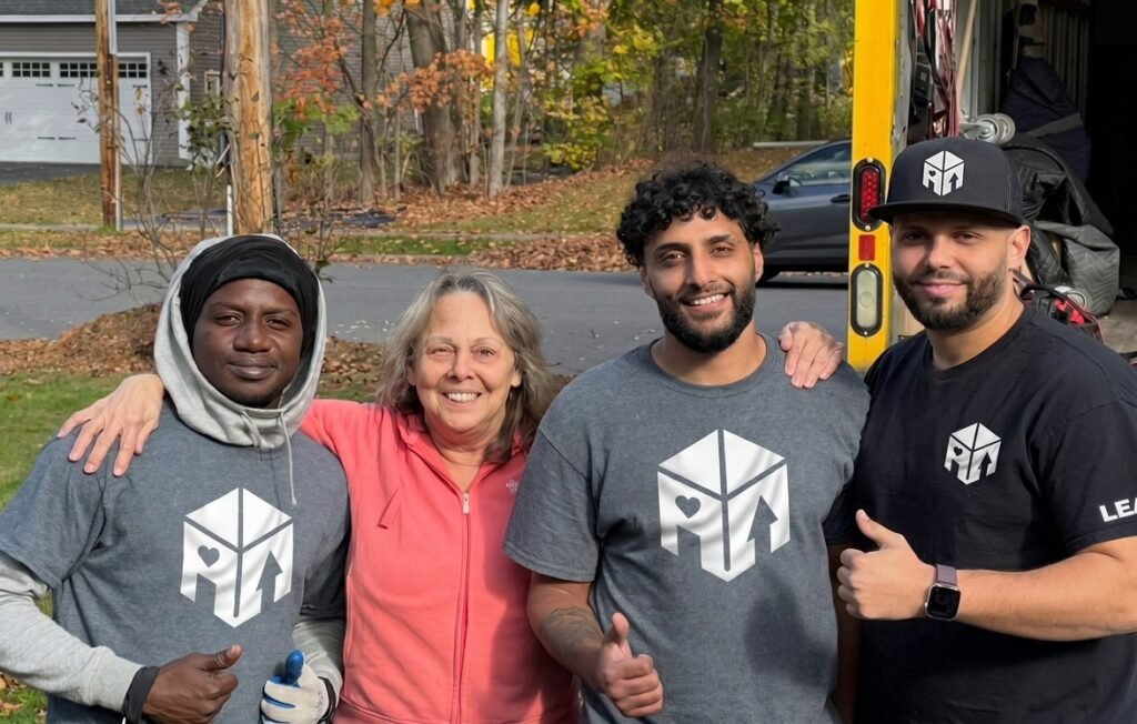 Meta Movers moving crew with a happy customer